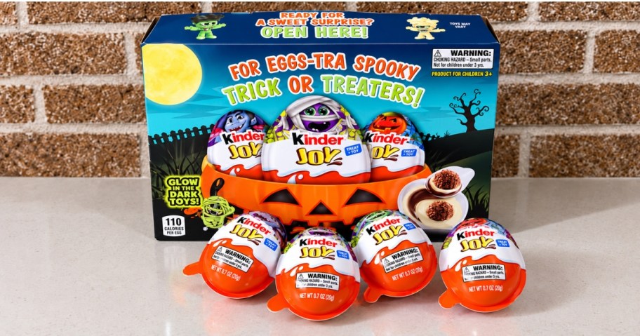 a box of Kinder Joy Halloween Eggs with 4 eggs in front