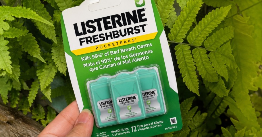hand holding a pack of Listerine PocketPaks