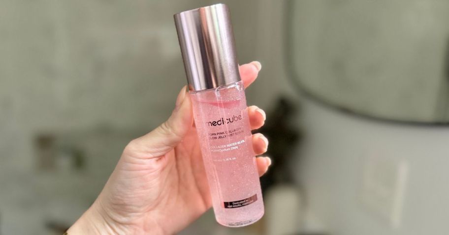 Medicube Jelly Mist Serum 3.38 ounces in hand.