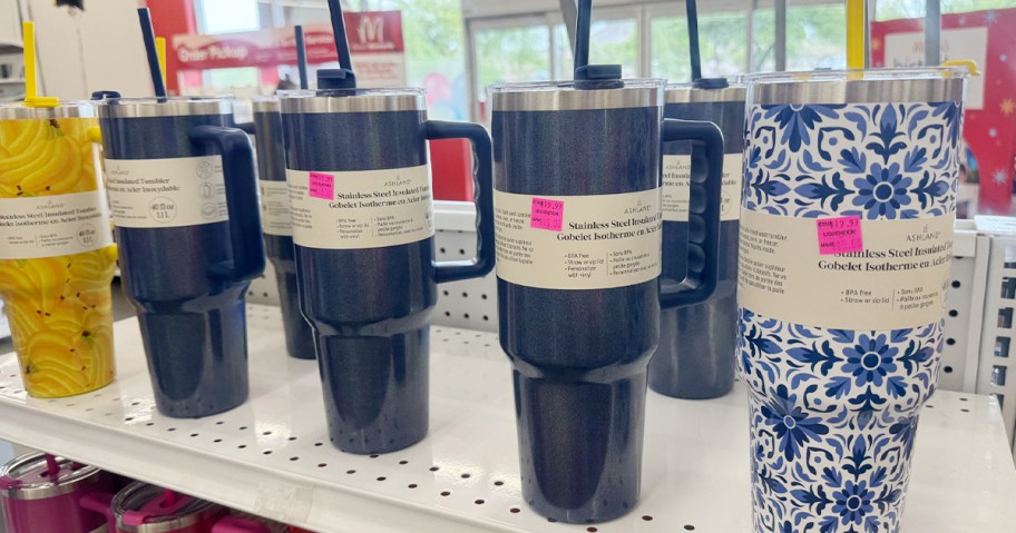 blue tumblers on shelf in store