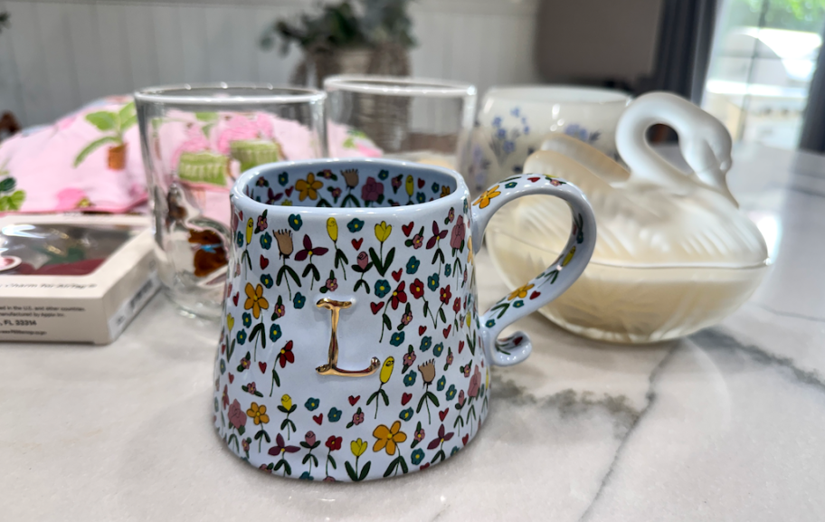 The Mud Fairy Stoneware Monogram Mug on counter