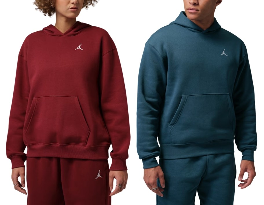 a woman and a man in 2 different styles and colors of nike sweatshirts