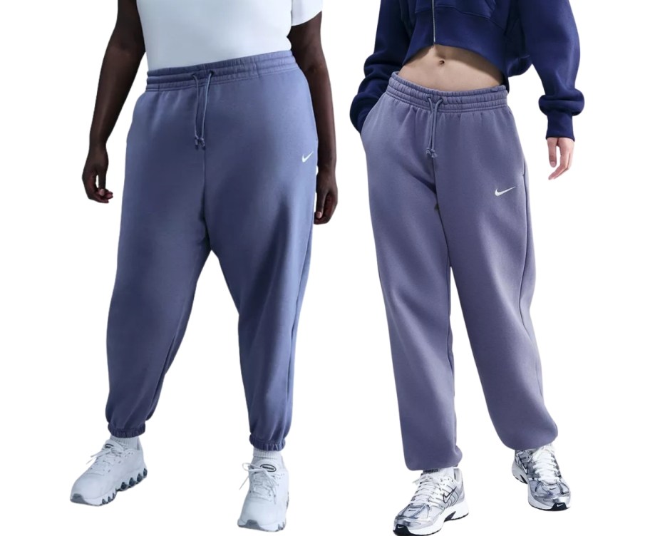 two women wearing nike sweat pants