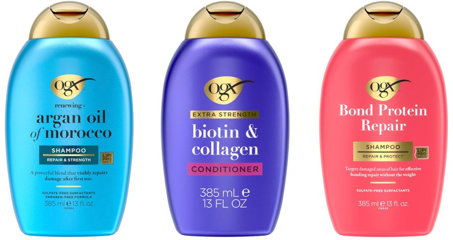 three bottles of ogx shampoo and conditioner