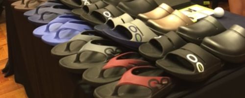 oofos sandals on display in store