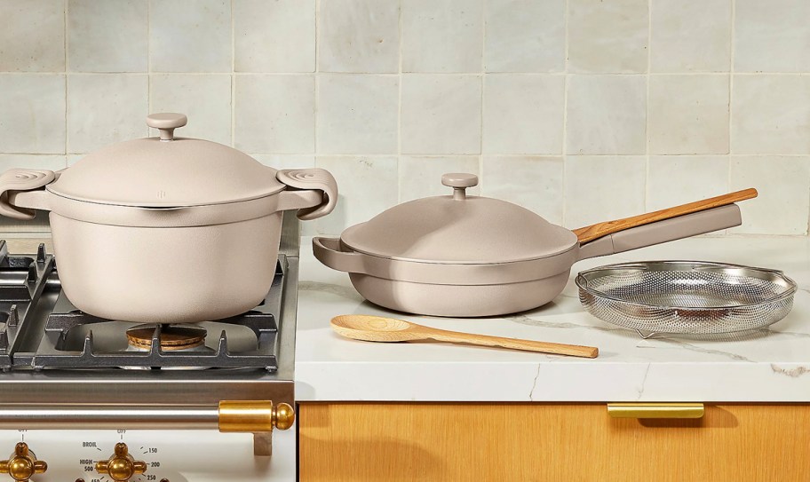 beige pot and pan in kitchen 