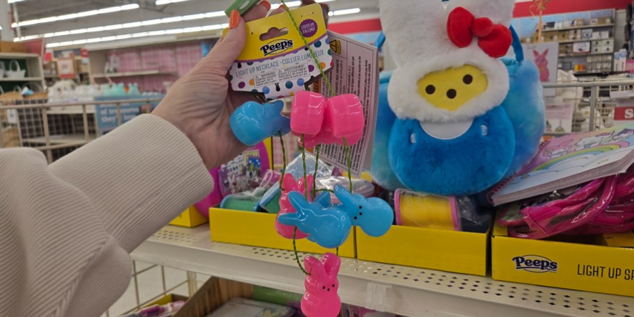 hand holding peeps necklace