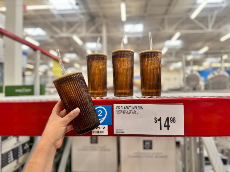 four brown ribbed glass tumblers on a store shelf