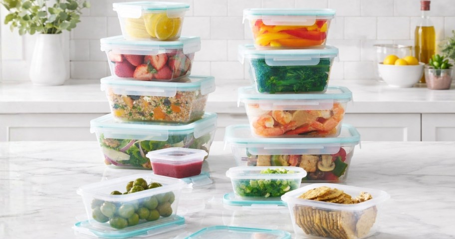 a set of plastic food storage containers on a kitchen counter