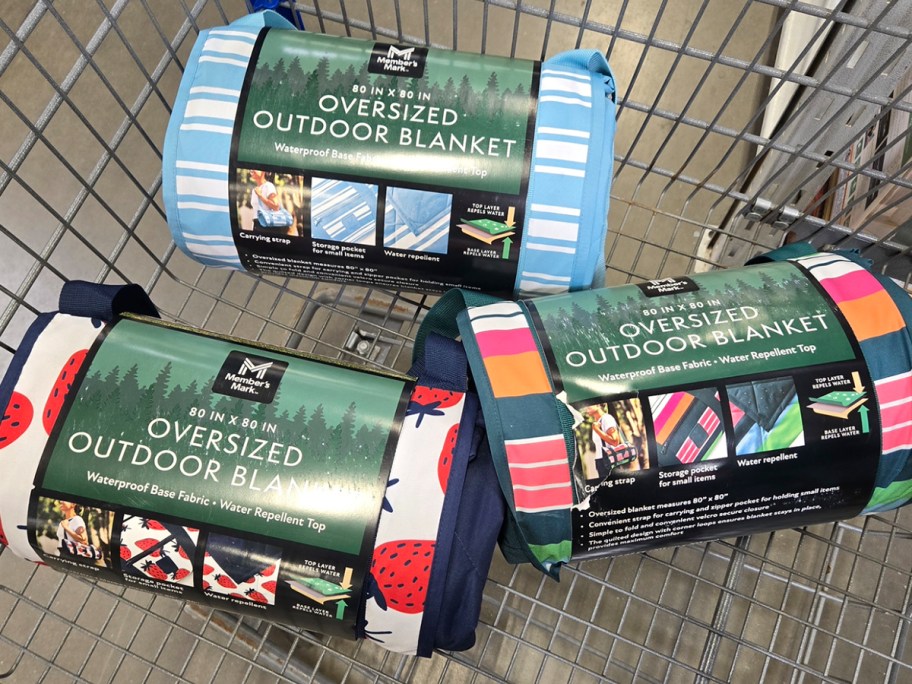 three outdoor blankets in shopping cart 