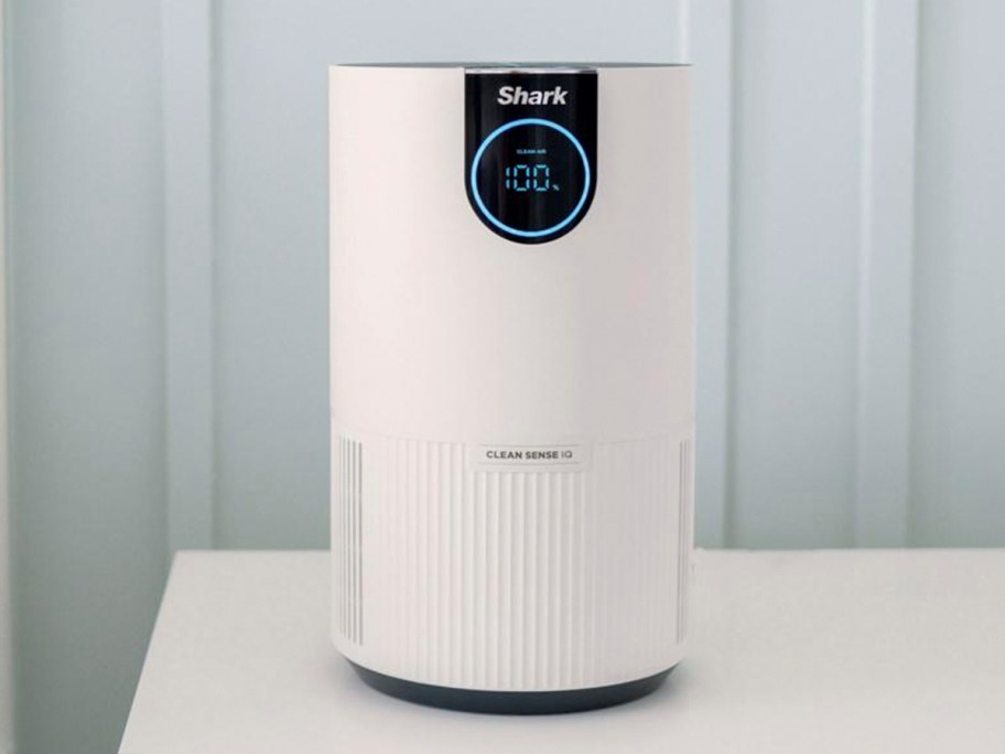 white shark air purifier on table