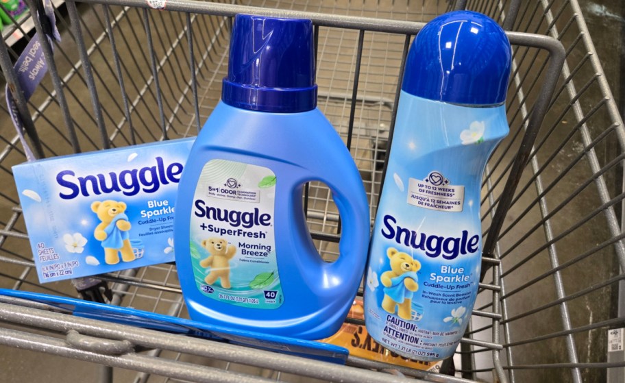 three snuggle fabric softener items in a store cart