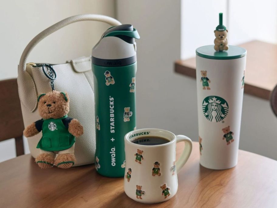 starbucks bear cups on table