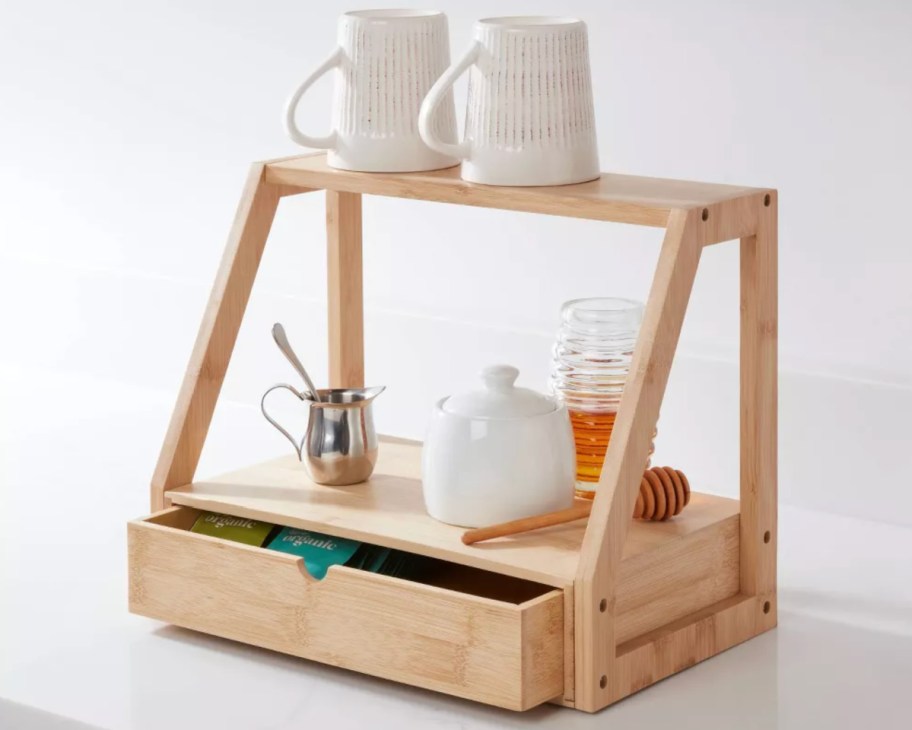 bamboo swing style organizer with coffee cups on top