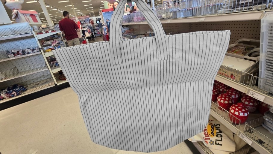 a black and white striped tote bag