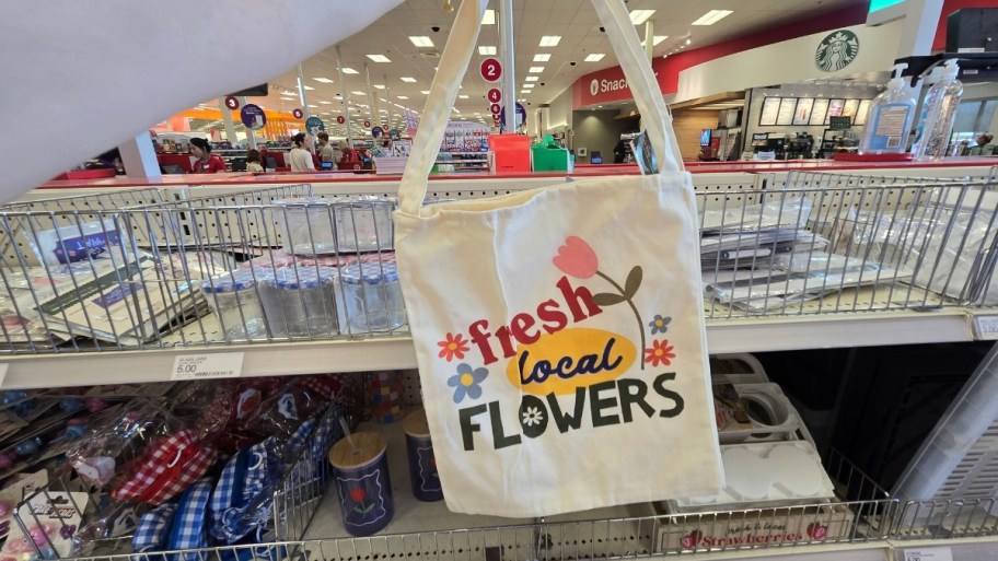 a cloth tote with words and graphics for fresh local flowers