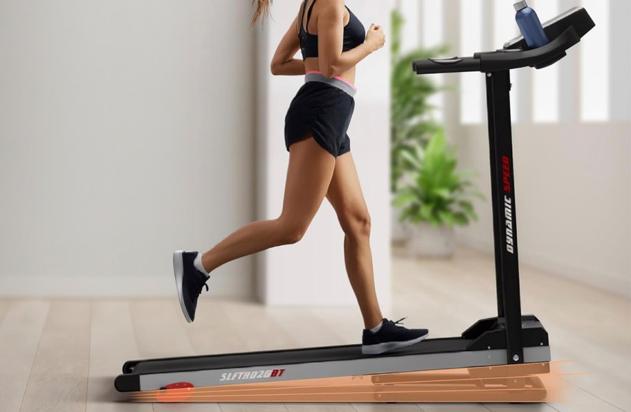 woman running on treadmill