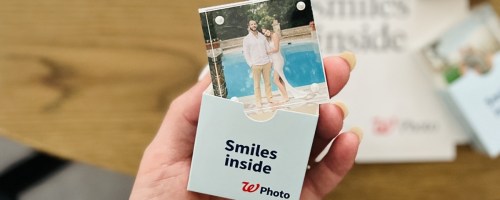 womans hand holding an acrylic photo block