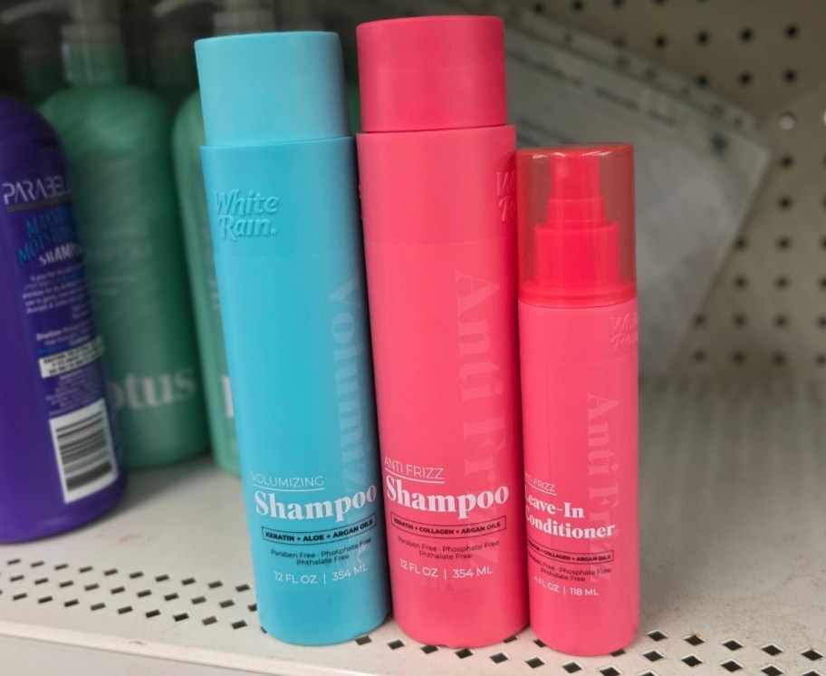 bottles of white rain shampoo and leav -in conditioner