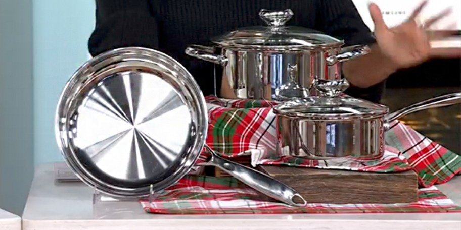 stainless steel cookware on table