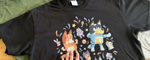 3 graphic tees, one has Bluey characters on it