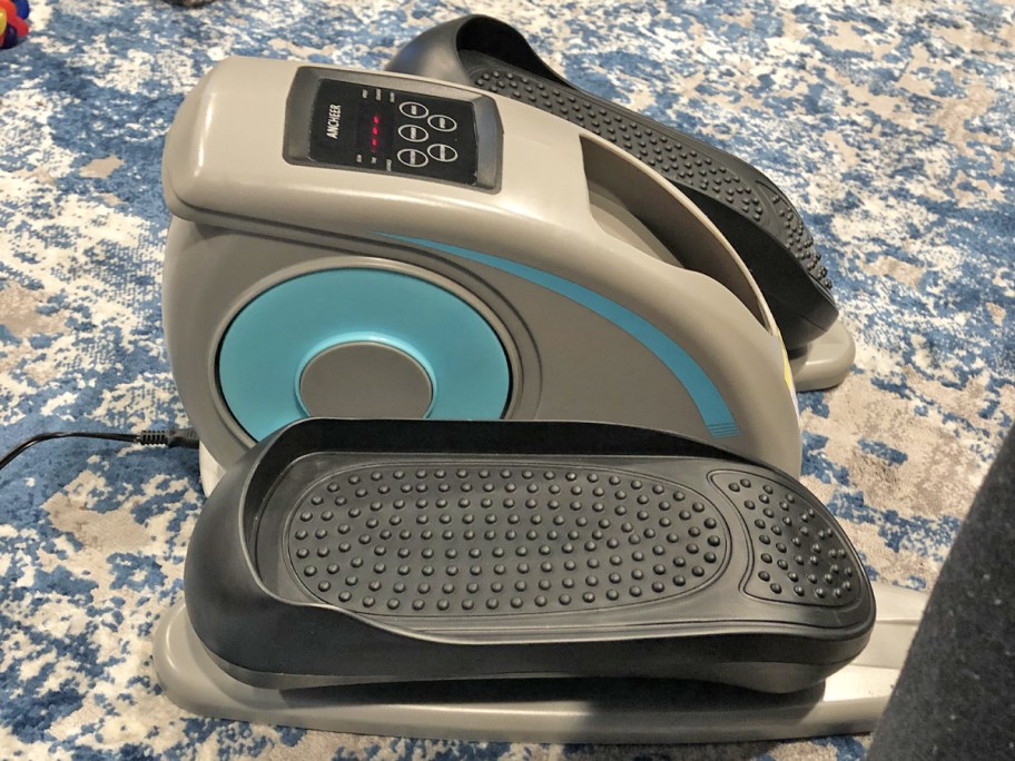 grey and blue ANCHEER Under Desk Elliptical Machine on carpet