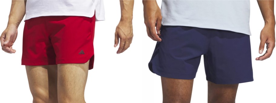 two men in red and blue shorts