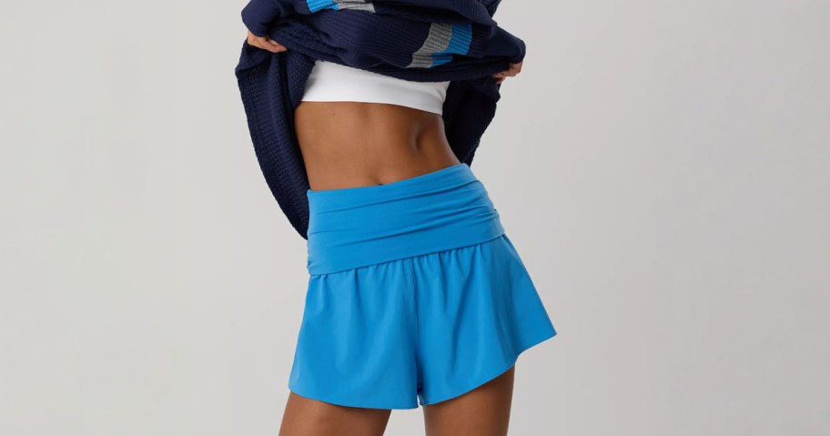 Aerie Fold Over Shorts being worn by a woman