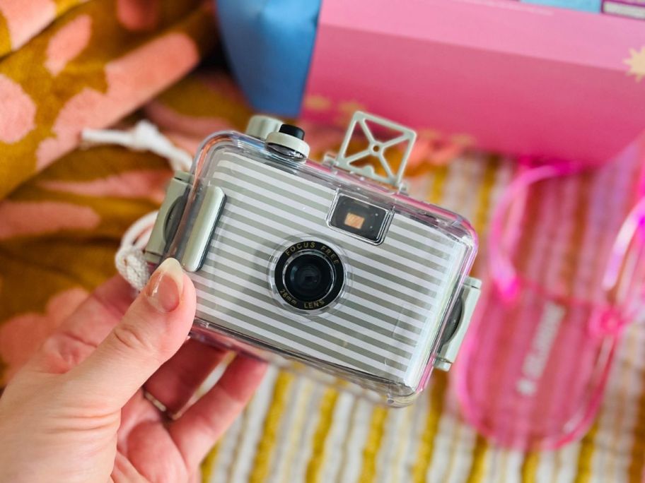 Anthropologie Sunnylife Underwater Camera in hand