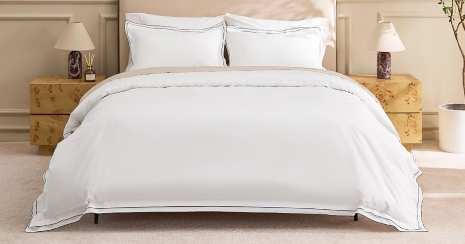 white duvet and shams set on a bed