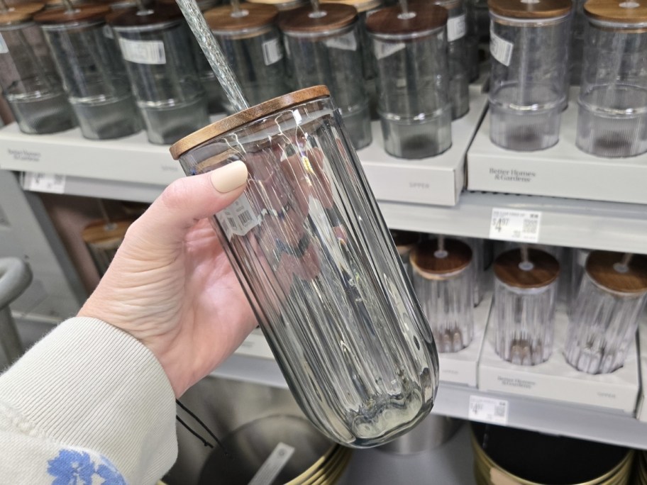 person holding Better Homes & Gardens Rib Smoke Glass Sipper in store
