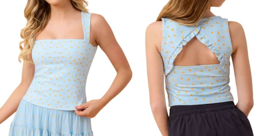 a woman and a girl wearing Blogilates Women's and girls Mommy & Me Ruffle Back Tank Top