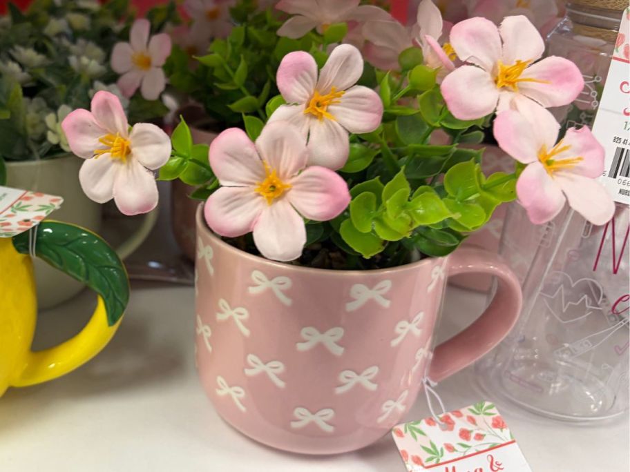 Bow Mug Planter w/ Artificial Plant in store