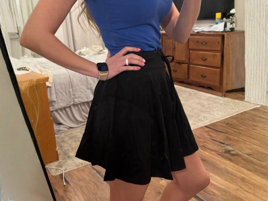 woman wearing Caracilia Women's Athletic Tennis Skort