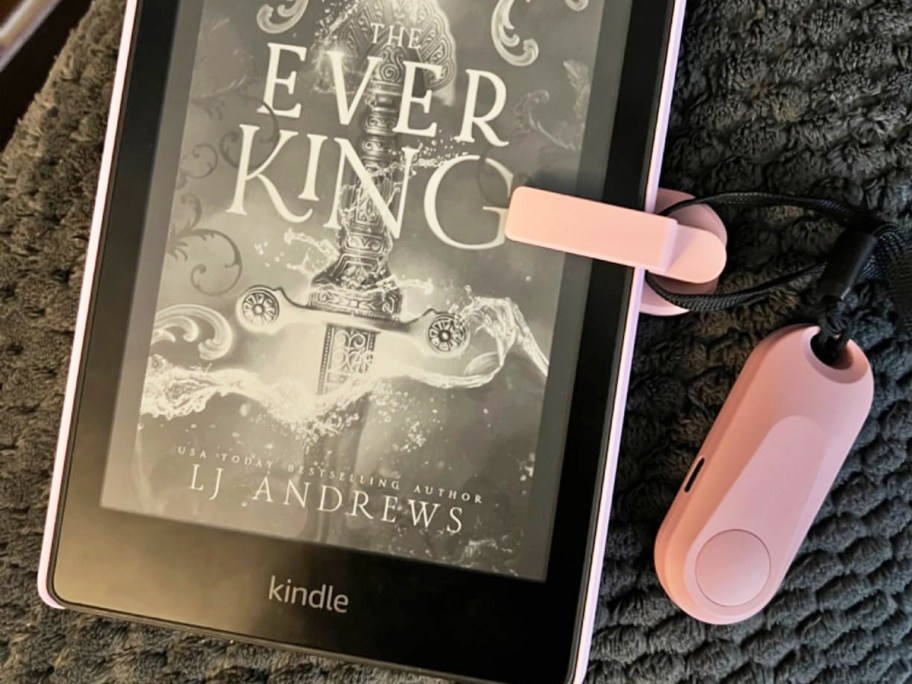 pink page turner and remote on a kindle