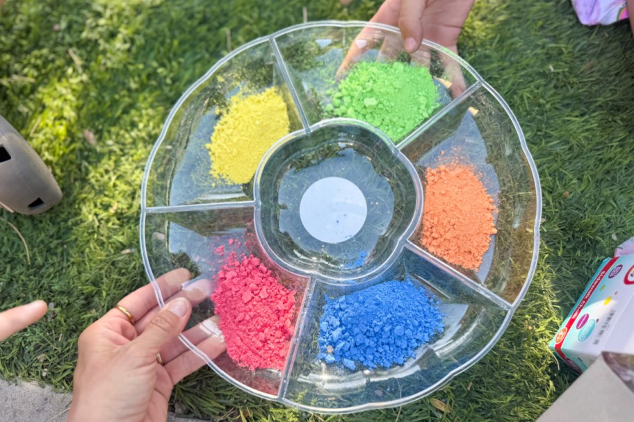 crushed chalk in circular tray with different colors