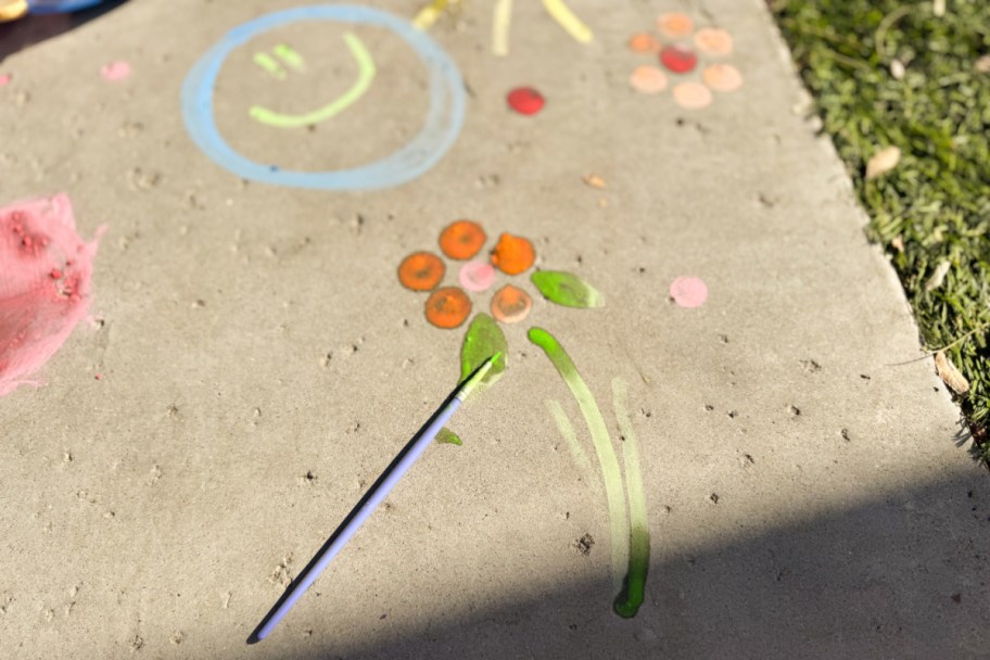 painted flower on sidewalk