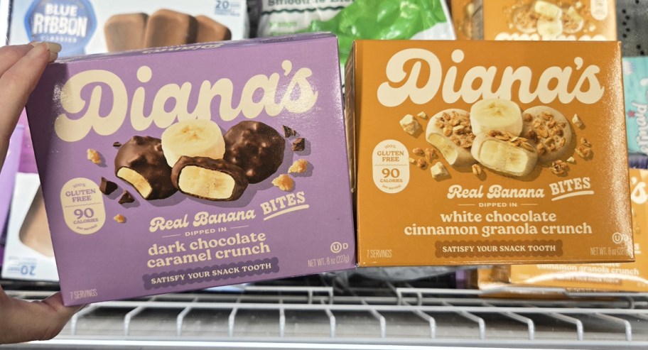 hand holding up two boxes of Diana's Bananas Bites in store