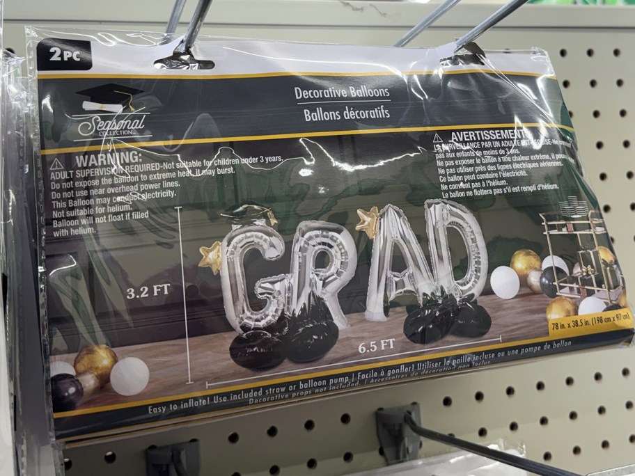graduation balloon on store display wall