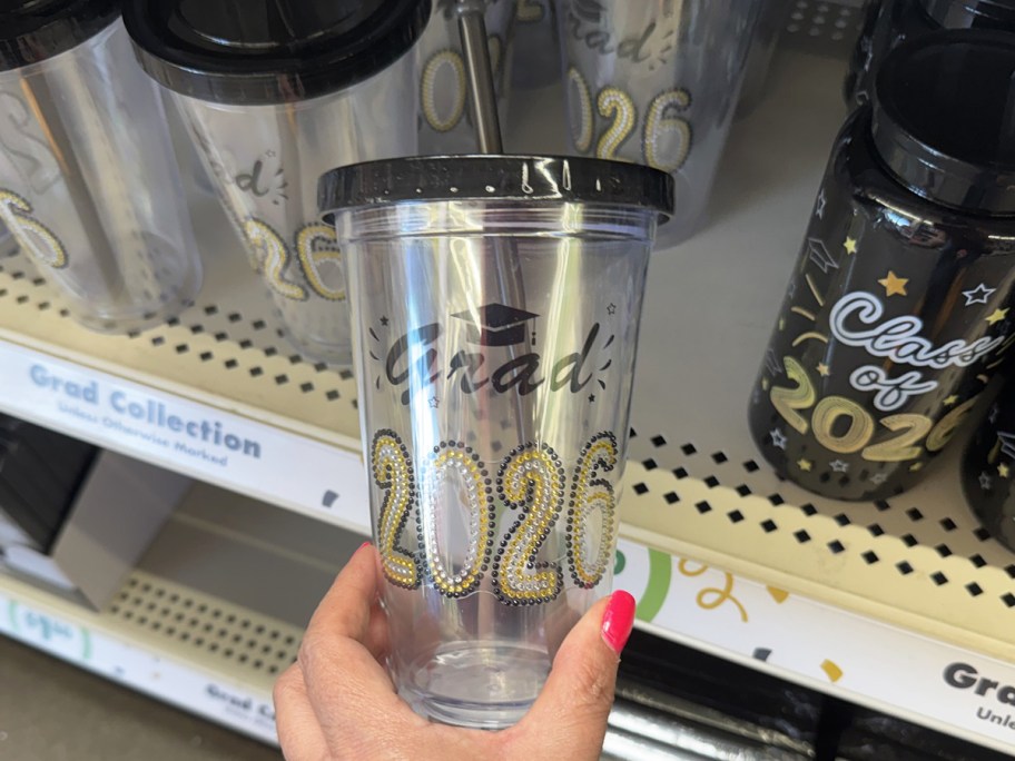 hand holding a 2026 graduation tumbler in store