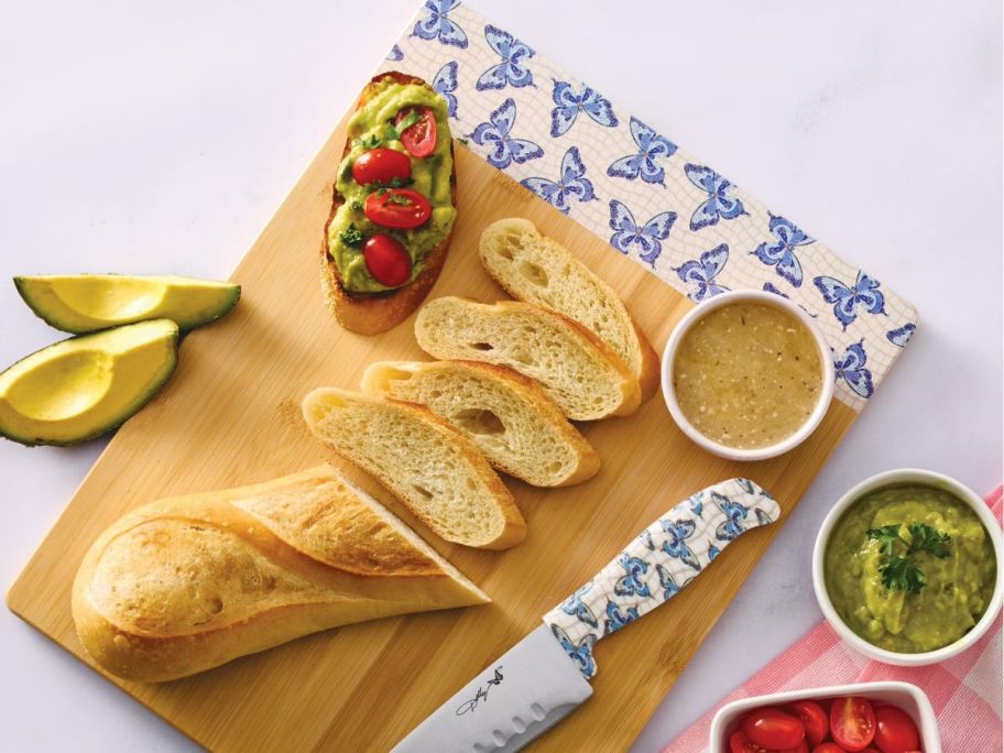 Dolly Parton Cutting Board with bread and slices of bread on it