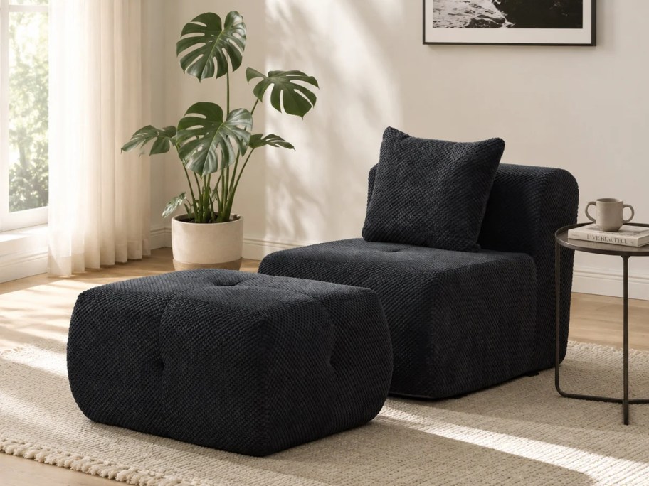 black armless chair and ottoman