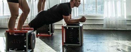 people working out using FITT cubes