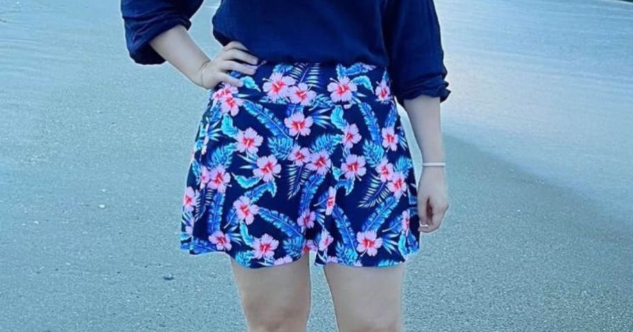 woman wearing Kayrth Women's High-Waisted Swim Skirt w/ Zipper Pockets on beach