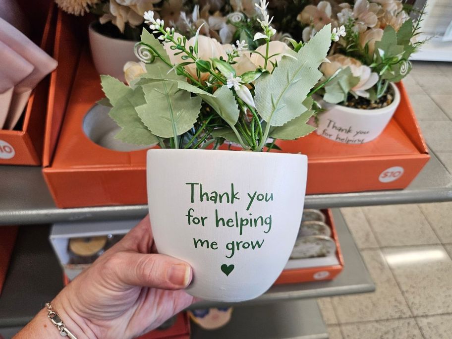 A planter with a faux plant from Kohl's Deal bar