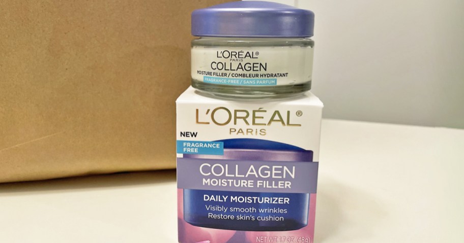 jar of L’Oreal Collagen Cream on top of its box