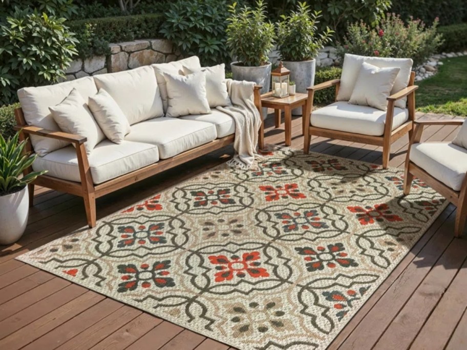 tan mosaic rug on a patio