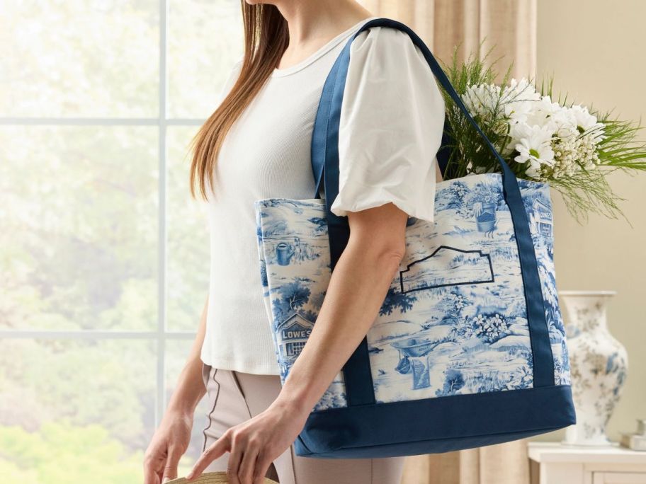 woman carrying Lowe's Blue Toile Canvas Tote Bag
