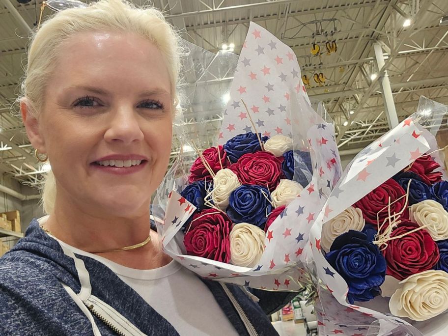 stefanie holding Lowe's Paper Flower Bouquet in Red, White, & Blue in store