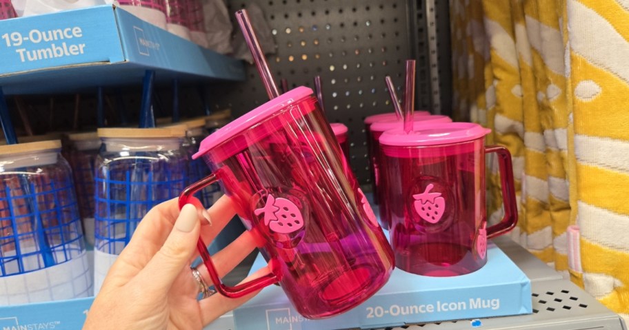 woman holding mainstays icon mug with strawberries in store